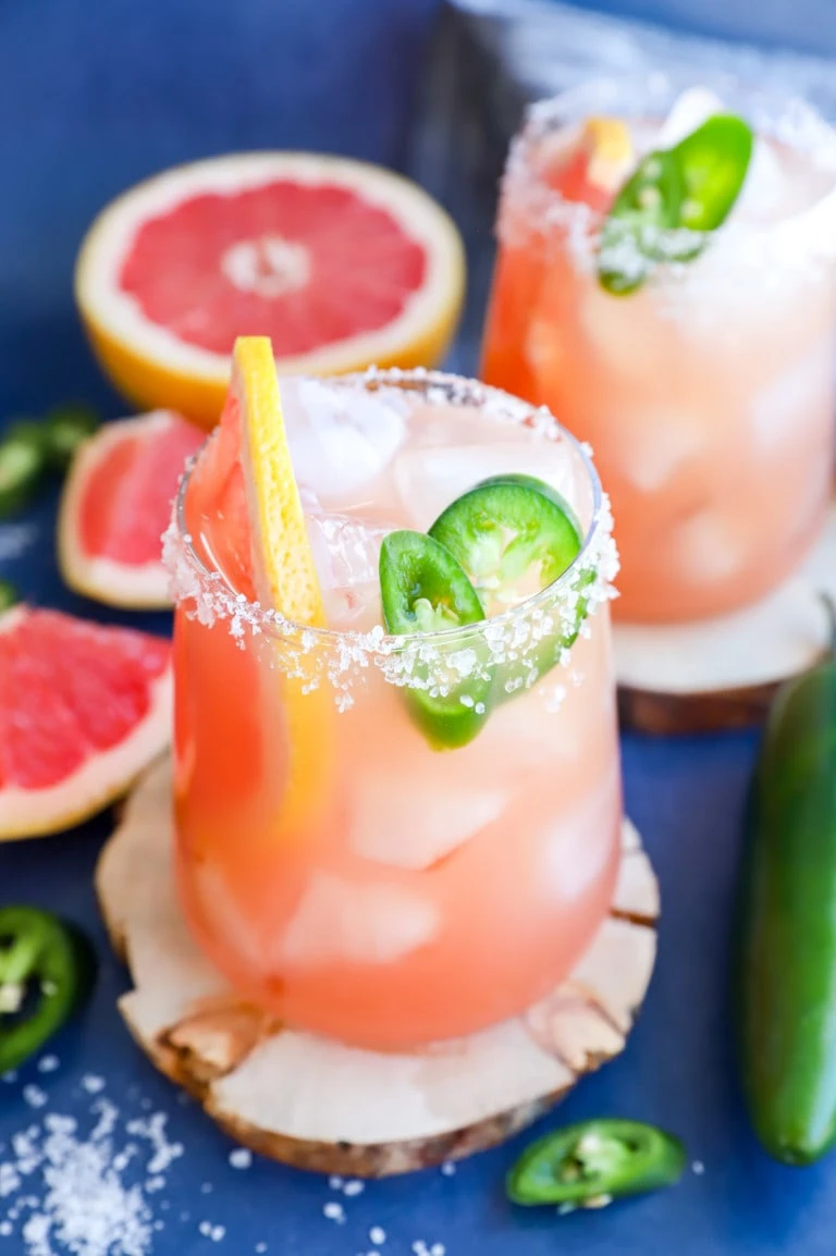 spicy grapefruit drink in glasses with salt rims