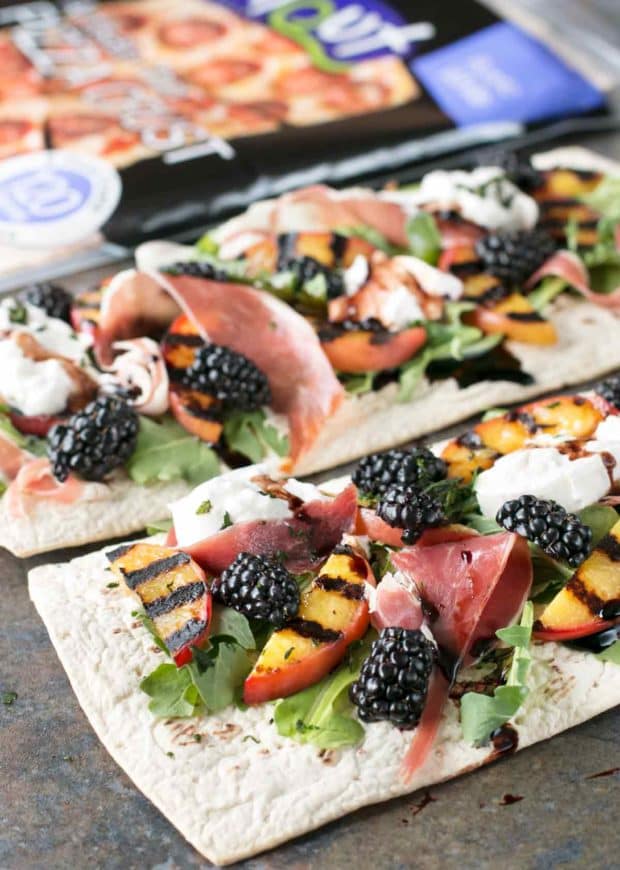 Grilled Peach Prosciutto Flatbread with Blackberry Balsamic Drizzle | cakenknife.com #flatoutflatbread #pizza #appetizer