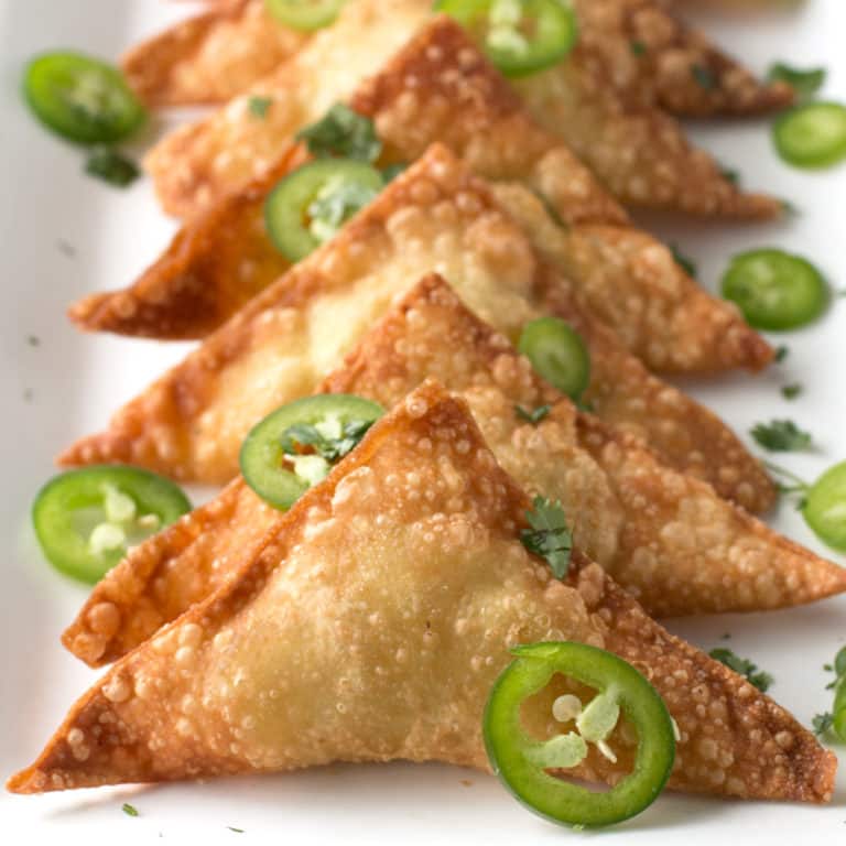 Jalapeño Avocado Cream Cheese Wontons | cakenknife.com #appetizer #party #tailgating