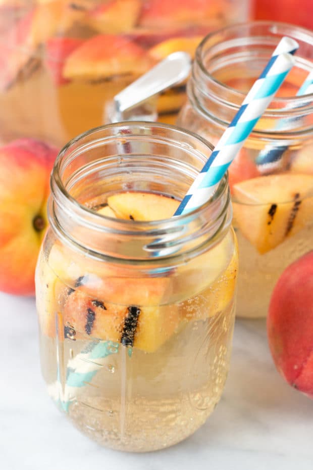 Sparkling Grilled Peach Sangria | cakenknife.com #grilling #peaches #wine #cocktail