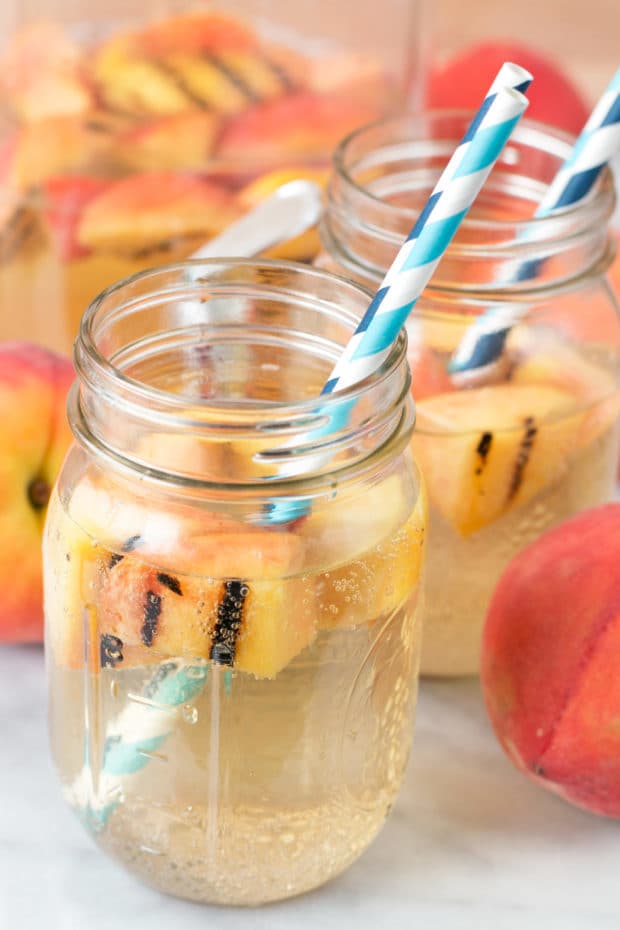 Sparkling Grilled Peach Sangria | cakenknife.com #grilling #peaches #wine #cocktail