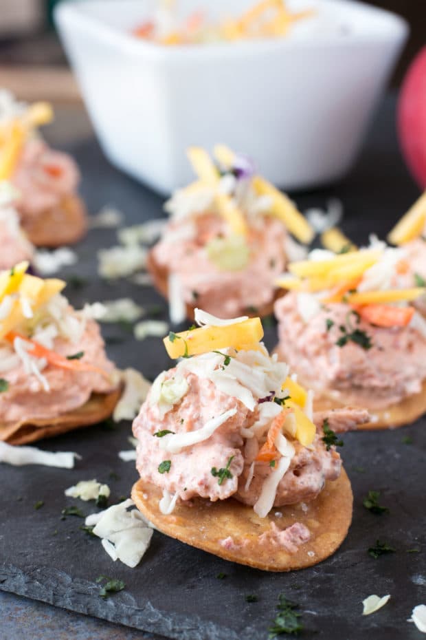 Bang Bang Shrimp Tostada Bites with Mango Slaw | cakenknife.com #appetizer #party #bangbangshrimp