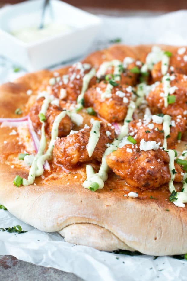 Buffalo Chicken Pizza with Blue Cheese Avocado Dressing | cakenknife.com #pizza #buffalochicken #chickenwings