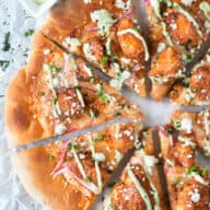 Buffalo Chicken Pizza with Blue Cheese Avocado Dressing | cakenknife.com #pizza #buffalochicken #chickenwings