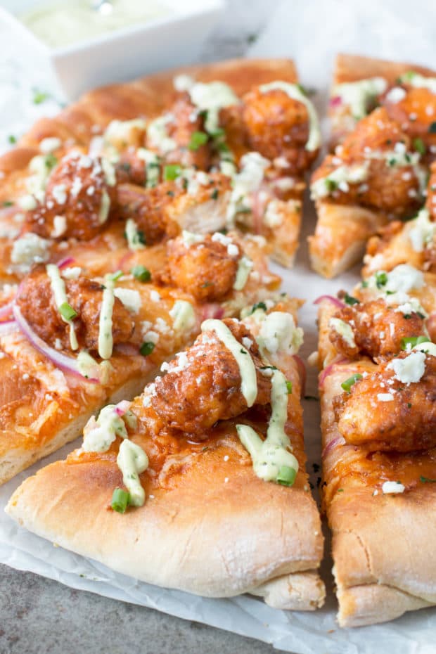 Buffalo Chicken Pizza with Blue Cheese Avocado Dressing | cakenknife.com #pizza #buffalochicken #chickenwings