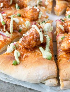 Buffalo Chicken Pizza with Blue Cheese Avocado Dressing | cakenknife.com #pizza #buffalochicken #chickenwings