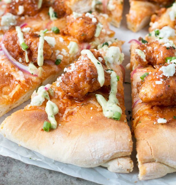 Buffalo Chicken Pizza with Blue Cheese Avocado Dressing | cakenknife.com #pizza #buffalochicken #chickenwings