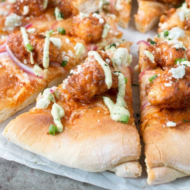 Buffalo Chicken Pizza with Blue Cheese Avocado Dressing | cakenknife.com #pizza #buffalochicken #chickenwings