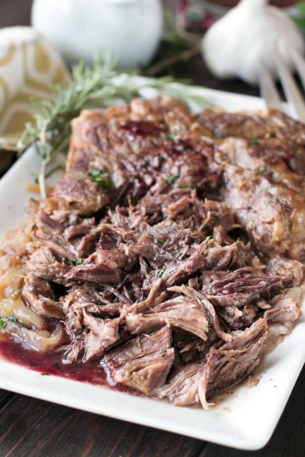 Slow Cooker Garlic Rosemary Pot Roast with Red Wine Sauce | cakenknife.com #ad #roastwiththemost #potroast #crockpot