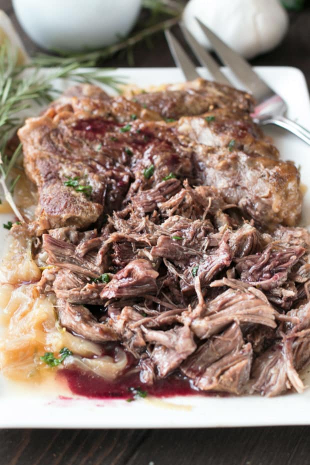 Slow Cooker Garlic Rosemary Pot Roast with Red Wine Sauce | cakenknife.com #ad #roastwiththemost #potroast #crockpot