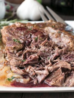 Slow Cooker Garlic Rosemary Pot Roast with Red Wine Sauce | cakenknife.com #ad #roastwiththemost #potroast #crockpot