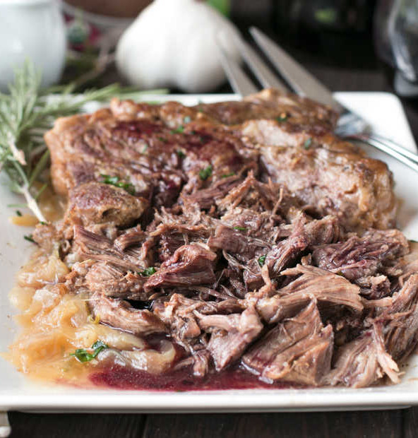 Slow Cooker Garlic Rosemary Pot Roast with Red Wine Sauce | cakenknife.com #ad #roastwiththemost #potroast #crockpot