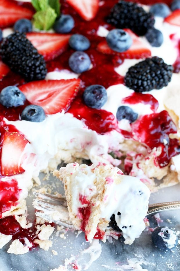 Fork full of dessert with berries