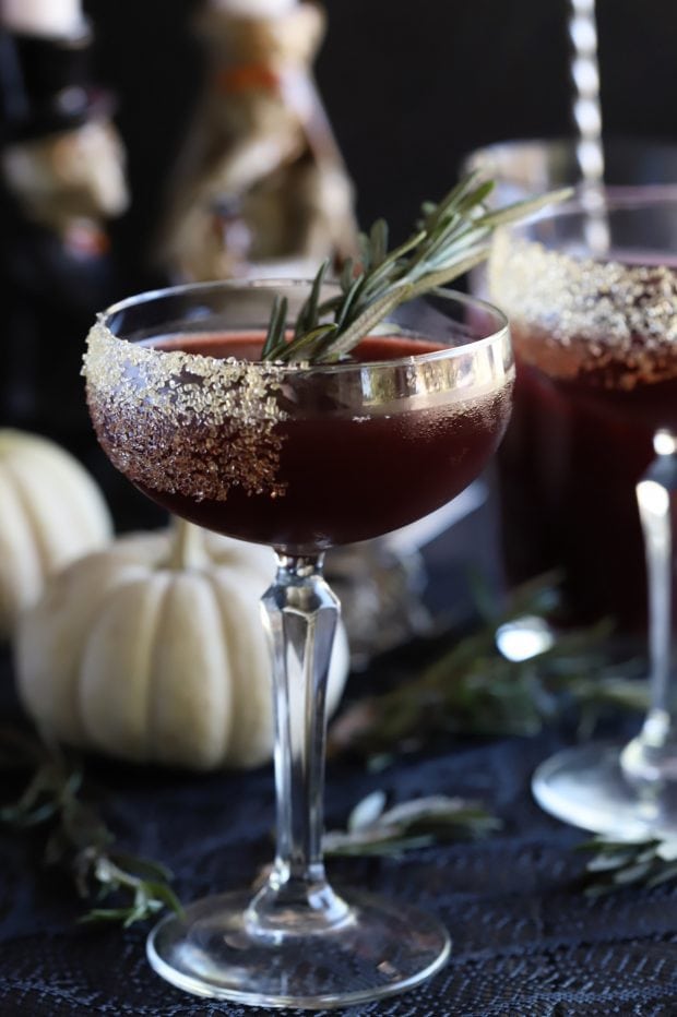 Spooky Pomegranate Drink with pumpkins