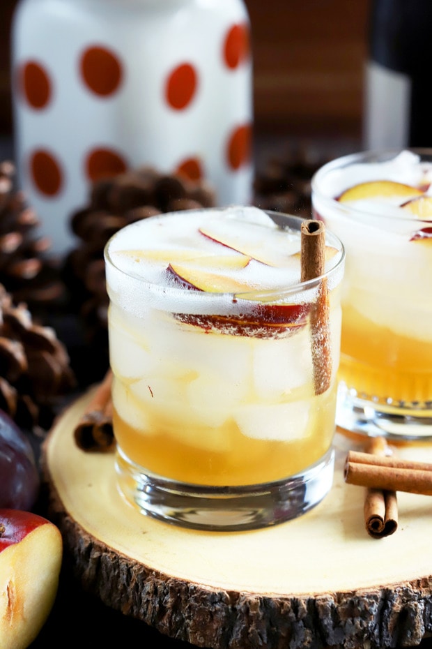 Aromatic Plum Smash 3 Close-up of Spiced Plum Smash Cocktail with ice and garnishes