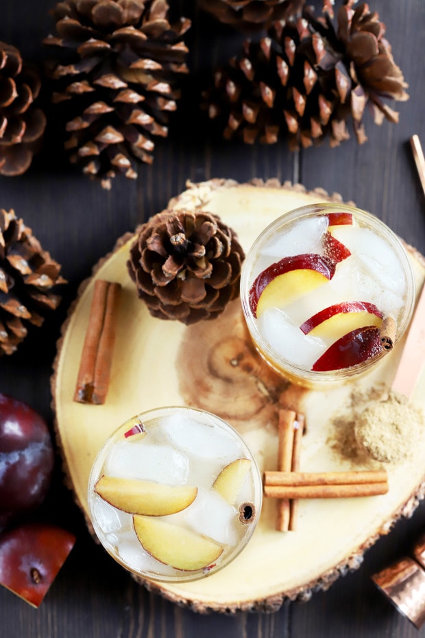 Aromatic Plum Smash 4 Spiced Plum Smash Cocktail ingredients being prepared on a wooden surface