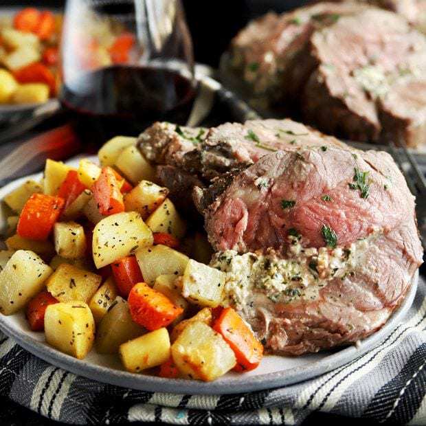 Herb goat cheese stuffed leg of lamb square photo