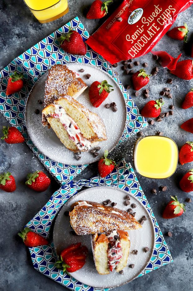 Fresh strawberries, chocolate, and orange juice with French toast