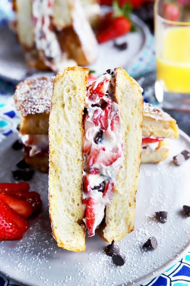 Plated French toast with berries and chocolate