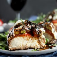 Avocado caprese chicken cut in half for dinner