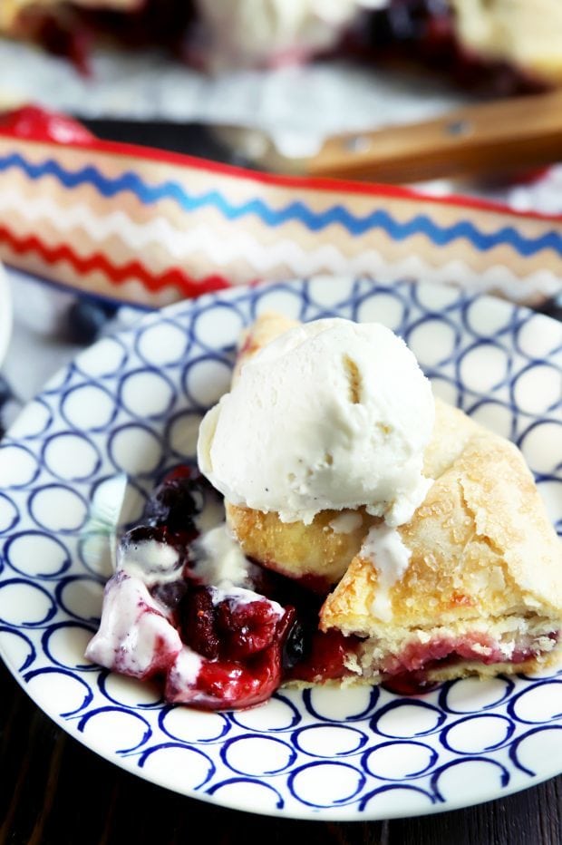 A freshly sliced berry galette