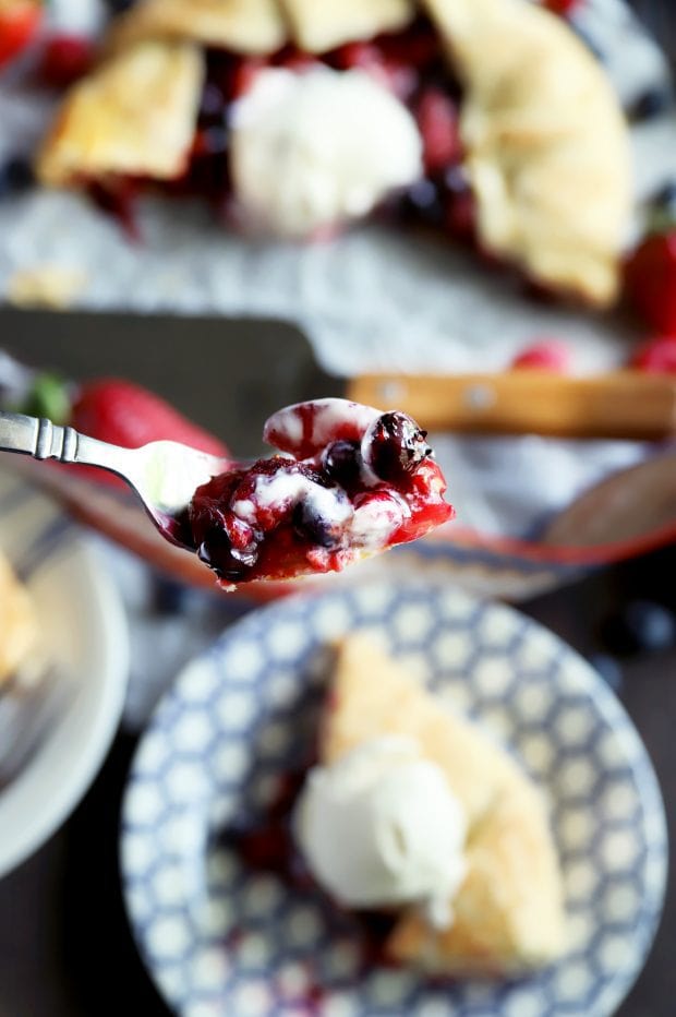 Fork full of berry galette