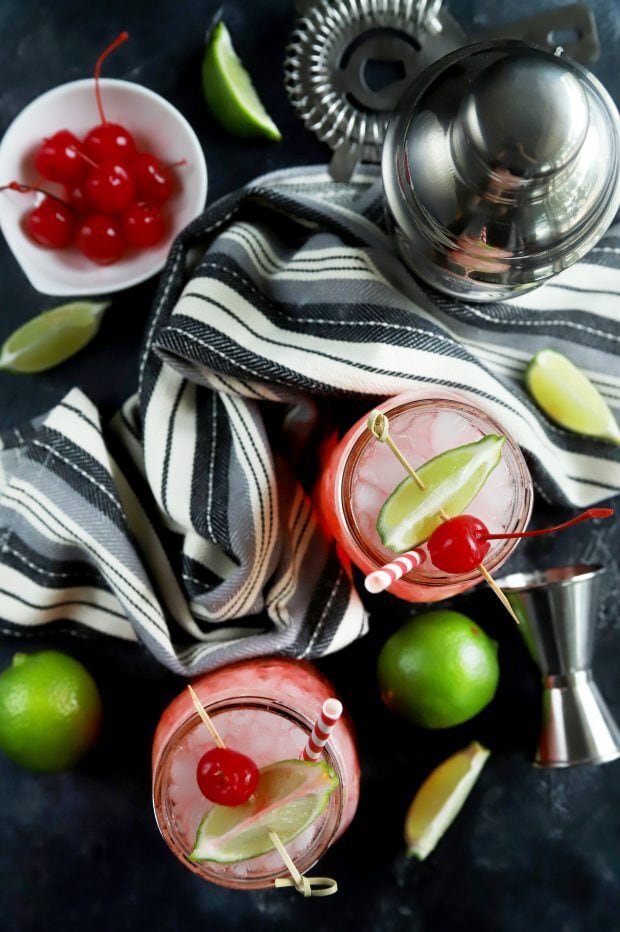 Summer cocktails with lime and cherries