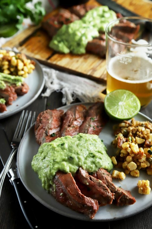 Sliced steak with beers and corn salad