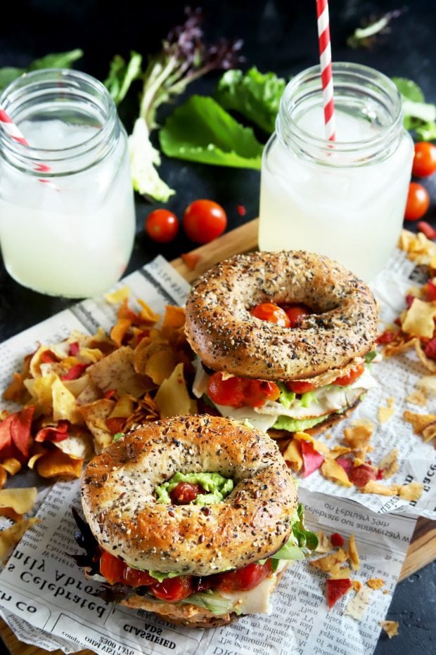 Sandwiches for a picnic with lemonade and chips