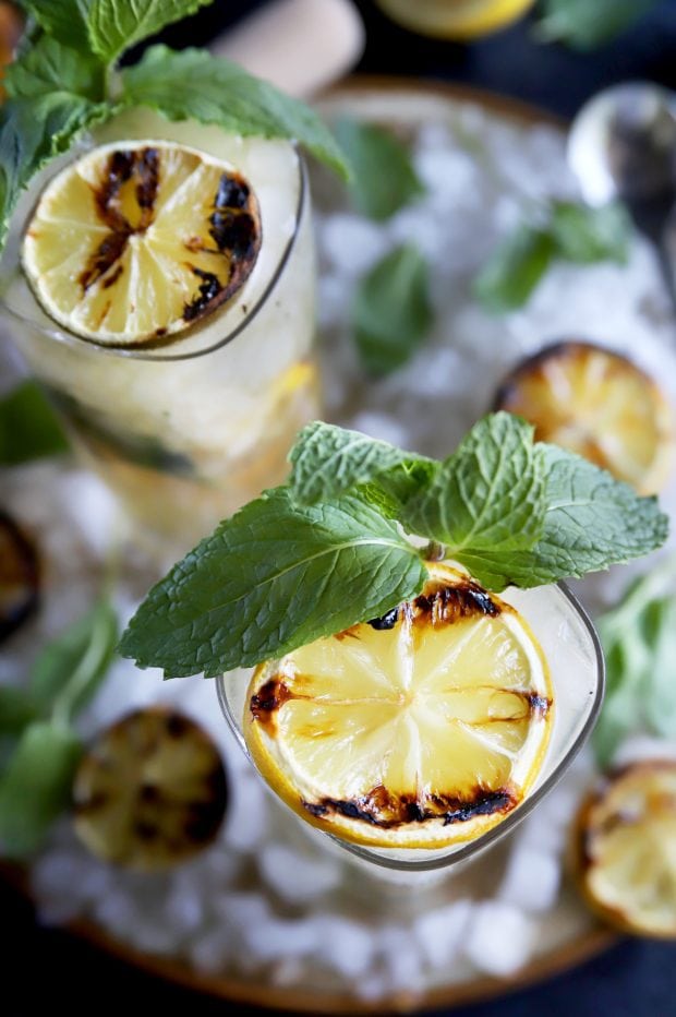 A grilled cocktail with citrus and mint