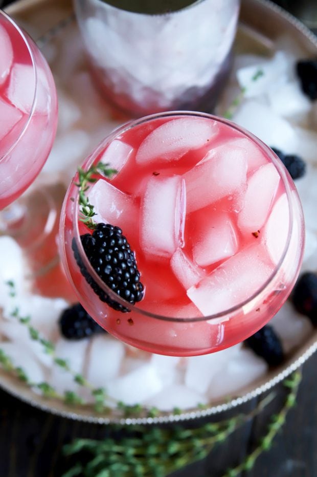 Gin cocktail with fruit and thyme