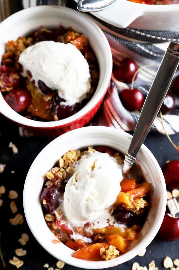 A small bowl of warm fruit crumble