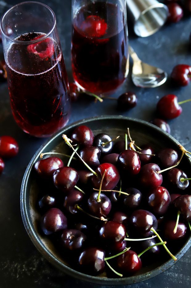 Overhead shot of a bowl of fresh red cherries