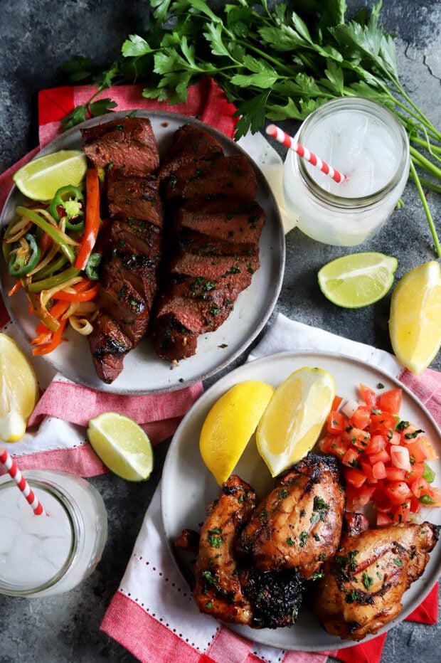 Top down shot of grilled steak and chicken thighs