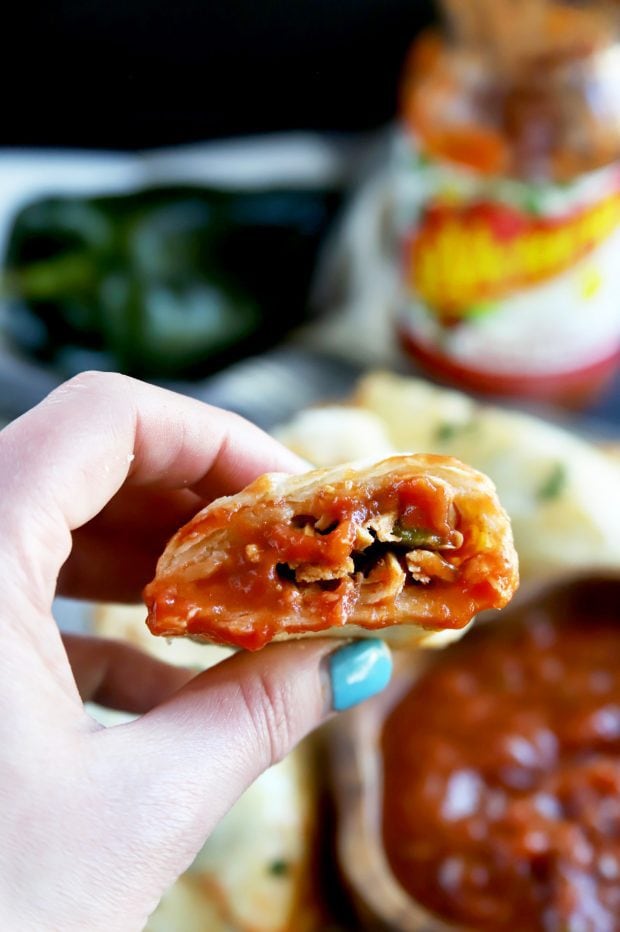 Mexican hand pie dipped in salsa