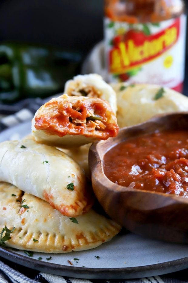 Mexican empanadas dipped in salsa