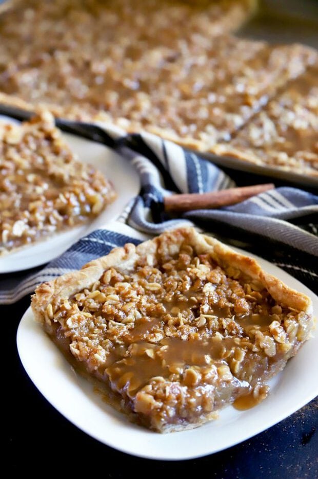 Slice of pie on a plate with caramel sauce