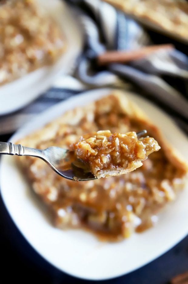 Fork full of homemade apple pie