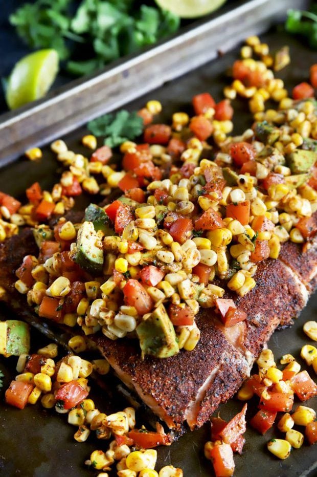 Side photograph of salmon with spice rub and salsa