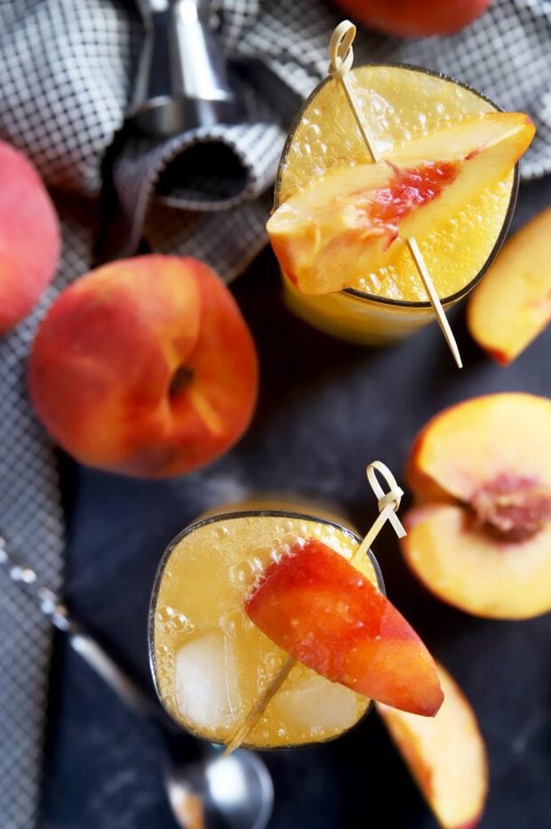 Peaches in cocktails with whiskey and ginger