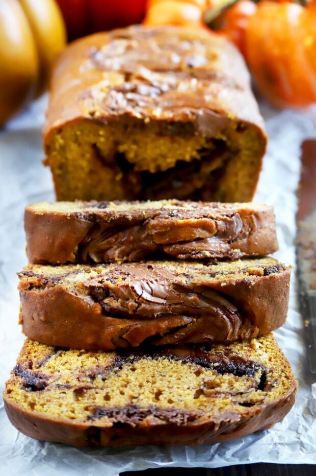 Sliced pumpkin banana bread with nutella swirl