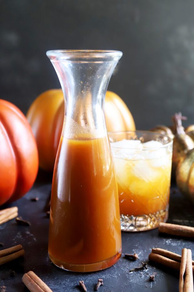 Pumpkin syrup and cocktail with pumpkins