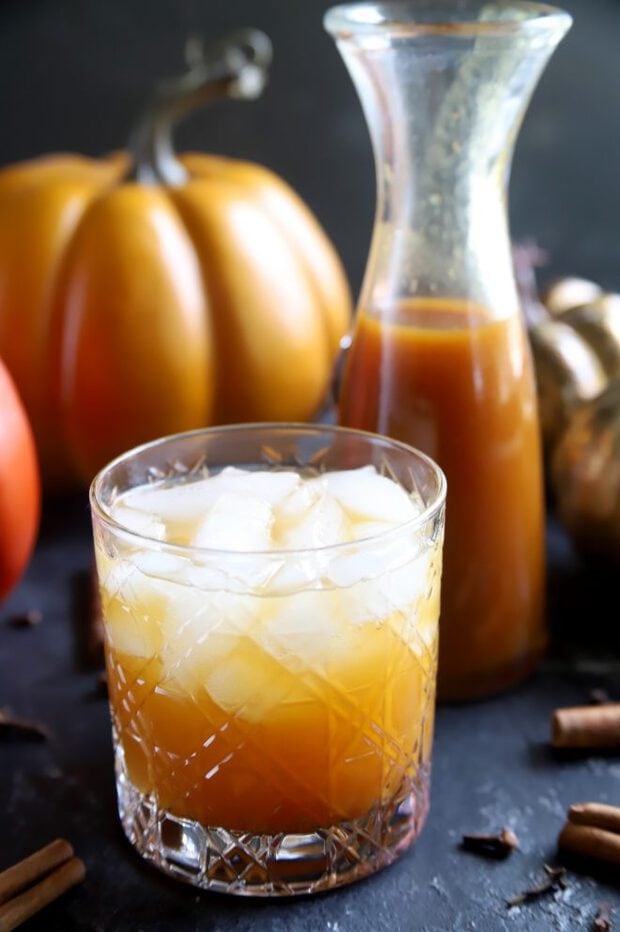 Pumpkin cocktail for fall with pumpkins