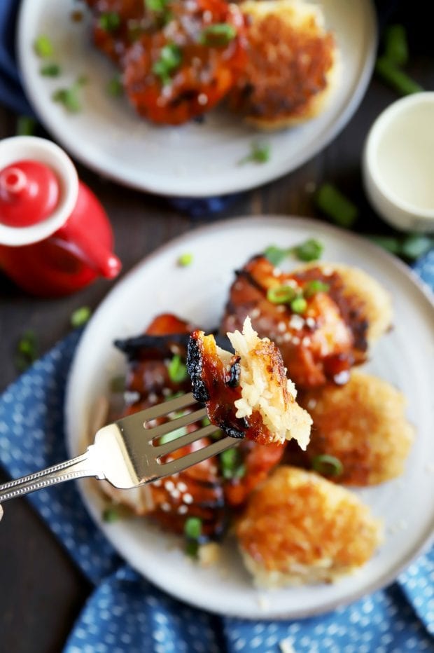 Bite of chicken and rice on a fork