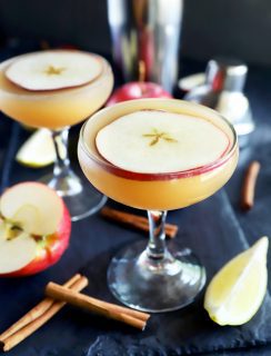 Apple cider whiskey sidecar cocktail in glasses