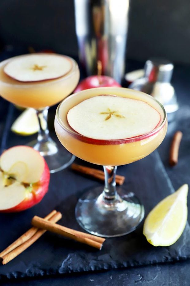 Apple cider whiskey sidecar cocktail in glasses