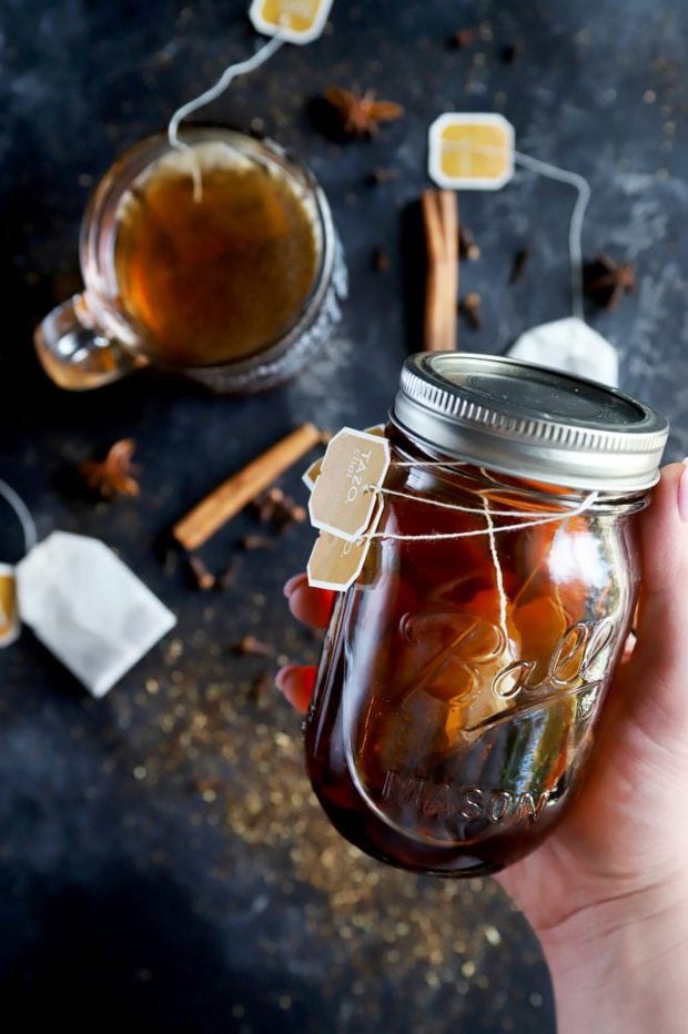 Holding a jar of bourbon with chai tea