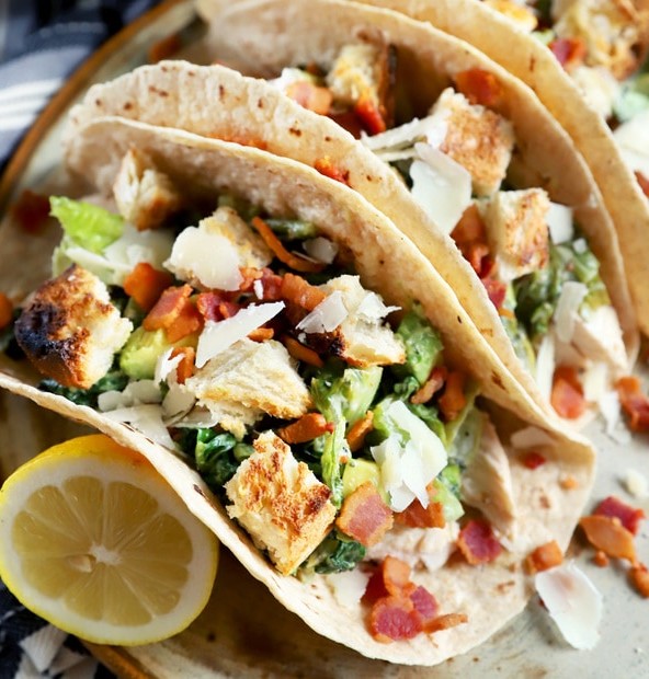 Thumbnail image of charred caesar salad chicken tacos