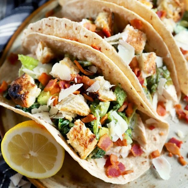 Thumbnail image of charred caesar salad chicken tacos