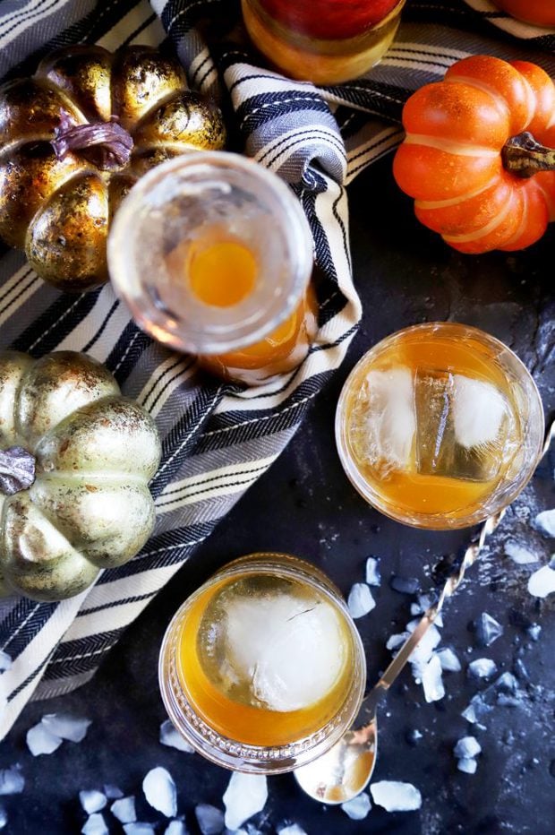 Overhead photo of pumpkin spice bourbon old fashioned cocktails